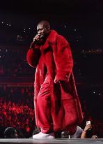 usher-red-faux-fur-coat.jpg