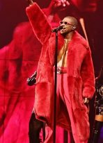 usher-red-fur-coat.jpg