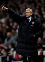 arsene-wenger-long-puffer-coat.jpg