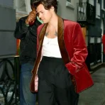 harry-styles-smoking-red-jacket.webp